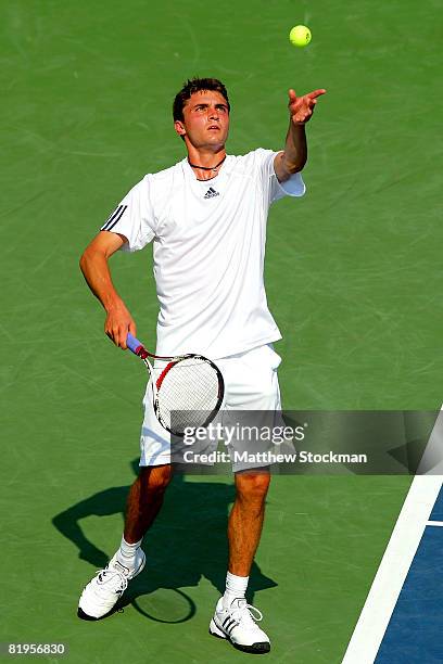 Gilles Simon of France serves to Benjamin Becker of Germany during the Indianapolis Tennis Championships at the Indianapolis Tennis Center July 16,...