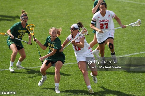 Ashtyn Hiron of Australia is challenged by Erica Evans of Canada during the semi-final match between Australia and Canada during the 2017 FIL...