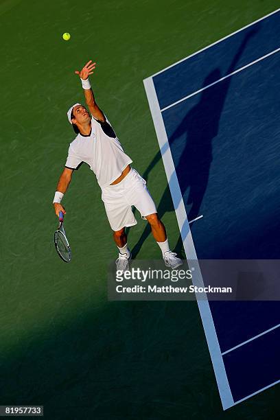 Tommy Haas of Germany serves to John Isner during the Indianapolis Tennis Championships at the Indianapolis Tennis Center July 16, 2008 in...