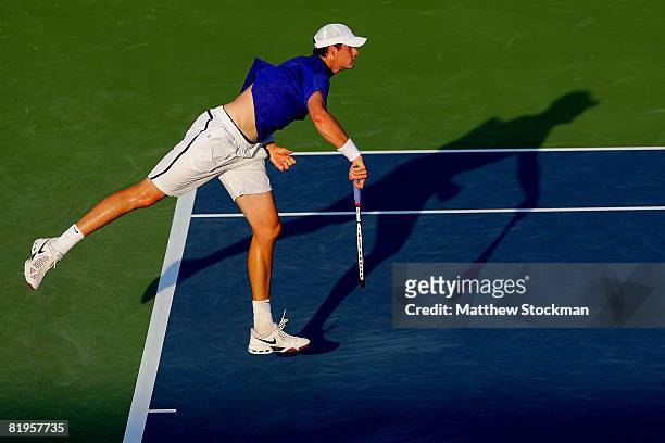 John Isner serves to Tommy Haas of Germany during the Indianapolis Tennis Championships at the Indianapolis Tennis Center July 16, 2008 in...