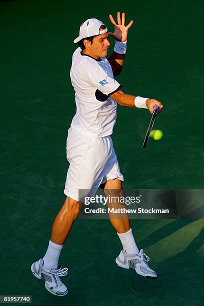 Tommy Haas of Germany returns a shot to John Isner during the Indianapolis Tennis Championships at the Indianapolis Tennis Center July 16, 2008 in...