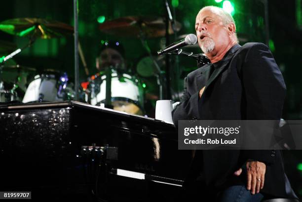 Billy Joel performs at Shea Stadium on July 16, 2008 in New York City.