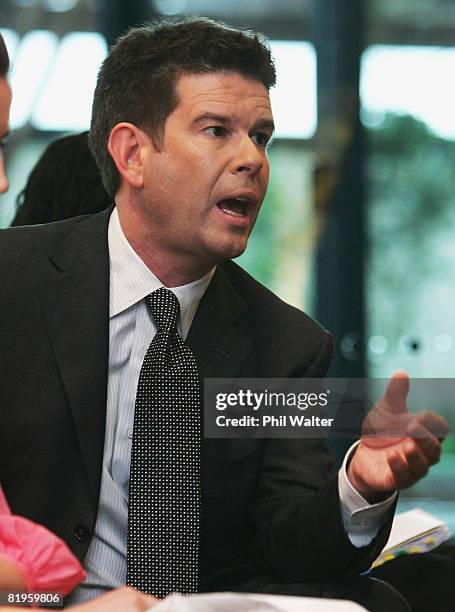 Broadcaster John Campbell puts a question to TVNZ CEO Rick Ellis during the press conference to announce the resignation of TVNZ broadcaster Tony...