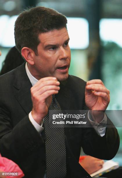 Broadcaster John Campbell puts a question to TVNZ CEO Rick Ellis during the press conference to announce the resignation of TVNZ broadcaster Tony...