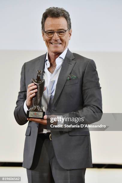 Bryan Cranston poses with the Giffoni Experience Award during the Giffoni Film Festival Day 7 on July 20, 2017 in Giffoni Valle Piana, Italy.