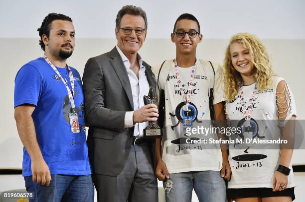 Bryan Cranston poses with the Giffoni Experience Award during the Giffoni Film Festival Day 7 on July 20, 2017 in Giffoni Valle Piana, Italy.