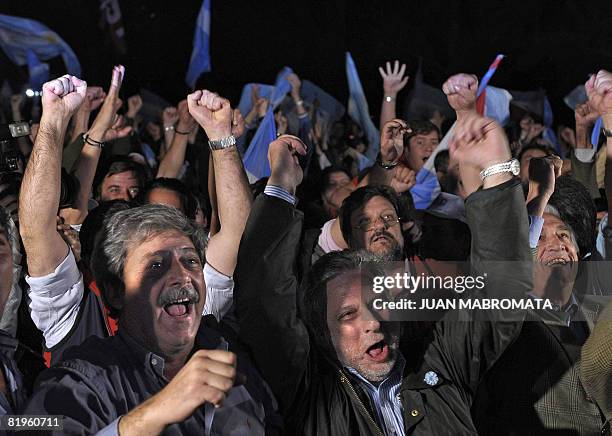 Farmers leaders Eduardo Bussi, president of the Argentine Agrarian Federation, Mario Llambias, president of the Argentine Farmers Confederation, and...