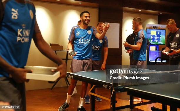 Leicester City's Riyad Mahrez relaxes after training In Hong Kong by playing table tennis during their pre-season tour of Hong Kong on July 21st ,...