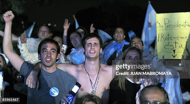 Farmers sing the country's national anthem after senators vote to reject a pro-government grain tax bill on July 17, 2008 in Buenos Aires....