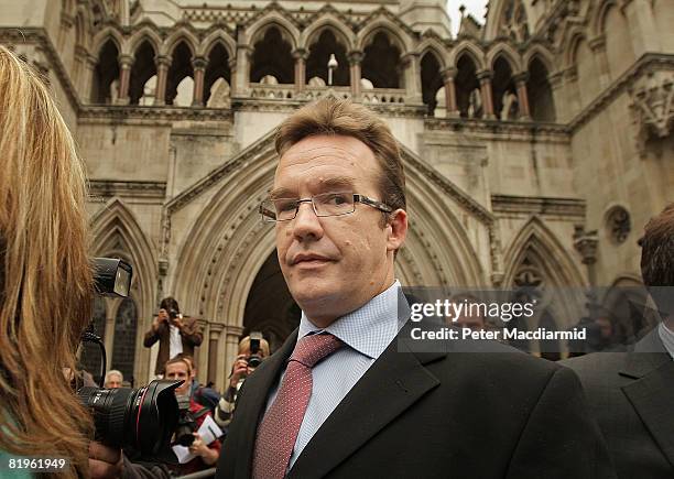 Robert Murat leaves the High Court on July 17, 2008 in London, England. Mr Murat, a suspect in the disappearance of Madeleine McCann, had accepted...