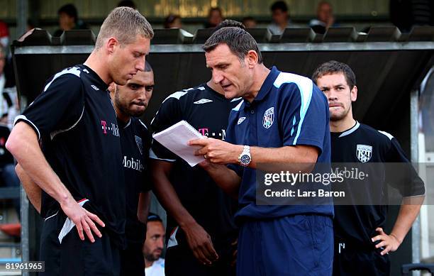 Manager Tony Mowbray of West Bromwich Albion gives instructions to his players during a pre season friendly match between Borussia Moenchengladbach...