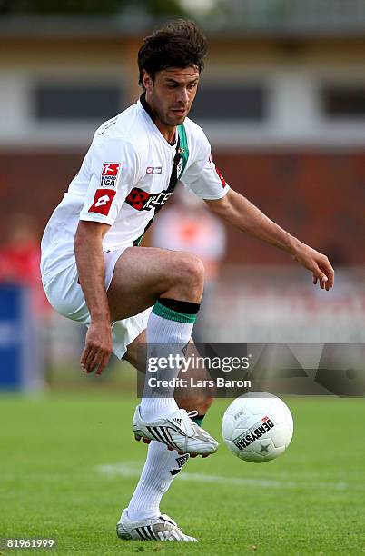 Roberto Colautti of Borussia Moenchengladbach takes control of the ball during a pre season friendly match between Borussia Moenchengladbach and West...