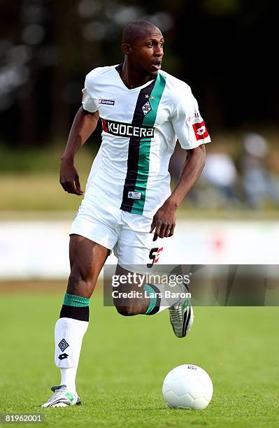 Steve Gohouri of Borussia Moenchengladbach runs with the ball during a pre season friendly match between Borussia Moenchengladbach and West Bromwich...