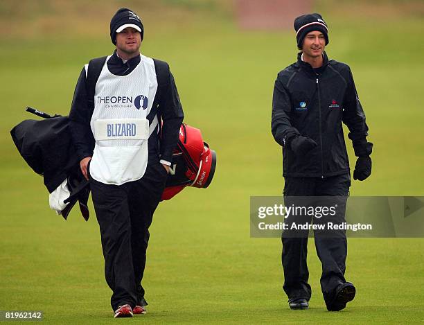 Amateur Rohan Blizard of Australia walks down the 1st hole with caddy Brent Watson during the First Round of the 137th Open Championship on July 17,...