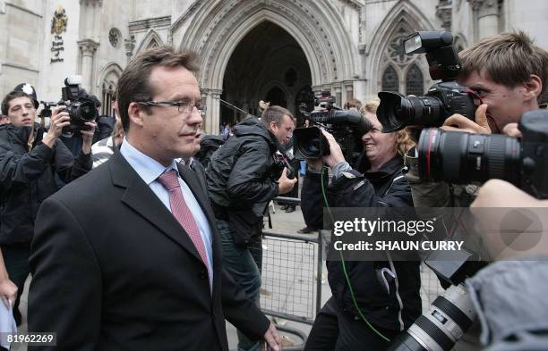 Suspect in the disappearance of Madeleine McCann, Robert Murat is pictured outside the High Court in central London, on July 17, 2008. A suspect in...