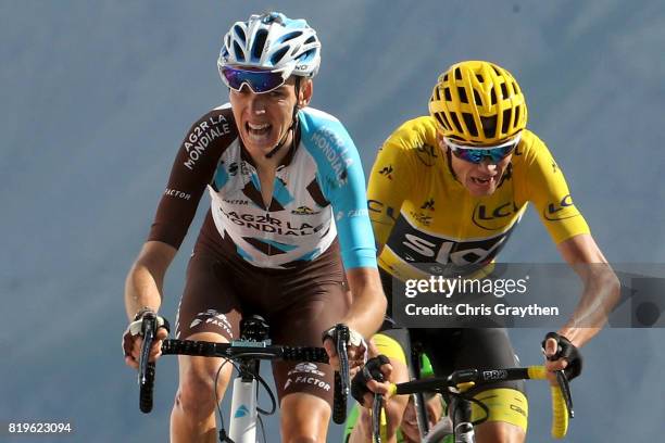 Christopher Froome of Great Britain riding for Team Sky in the leader's jersey sprints to the finish with Romain Bardet of France riding for AG2R La...