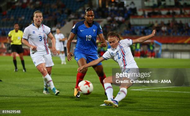 Sif Atladottir of Iceland Women clears the ball from Marie-Laure Delie of France Women during the UEFA Women's Euro 2017 match between France and...
