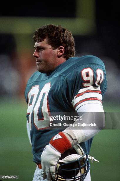 Linebacker Andy Hendel of the Miami Dolphins looks on from the sideline during a Monday Night Football game against the Cleveland Browns at Municipal...