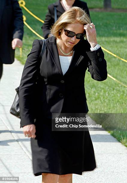 News anchor Katie Couric arrives for the funeral for former White House Press Secretary Tony Snow at the Basillica of the National Shrine of the...