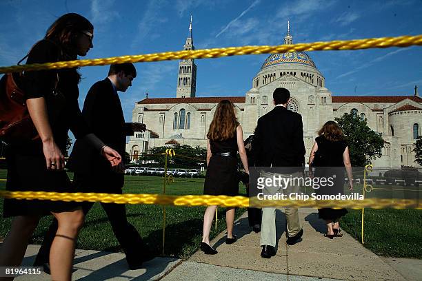 Guests arrive for the funeral for former White House Press Secretary Tony Snow at the Basillica of the National Shrine of the Immaculate Conception...