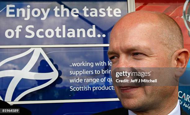 Shadow Foreign Secretary William Hague licks his lips during a visit to Tesco in Shettleston as he supports Davina Rankin the Conservative Party...