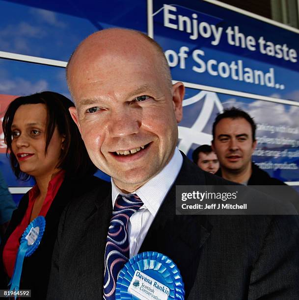 Shadow Foreign Secretary William Hague stands with Davina Rankin the Conservative Party candidate in the Glasgow East by-election on a visit to Tesco...