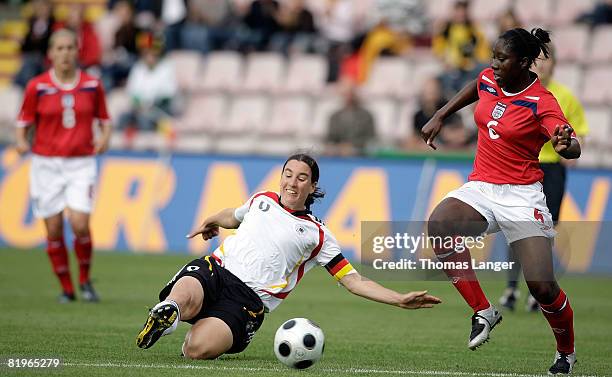 Birgit Prinz of Germany and Anita Asante of England battle for the ball during the Women's International friendly match between Germany and England...