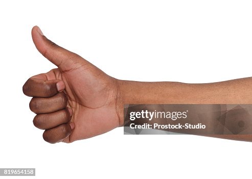 African american hand making thumb up gesture African american hand making thumb up gesture