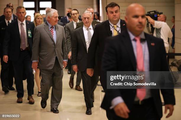 Secretary of State Rex Tillerson and Defense Secretary James Mattis arrive to brief members of the House of Representatives in the U.S. Capitol...