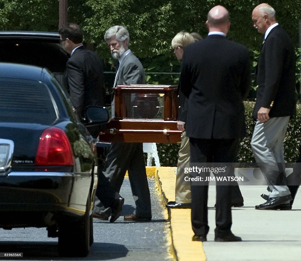 An urn carrying the ashes of former Whit