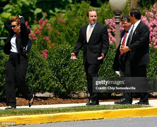 Former White House Press Secretary Scott McClellan leaves the funeral for fellow former White House Press Secretary Tony Snow at the National Shrine...