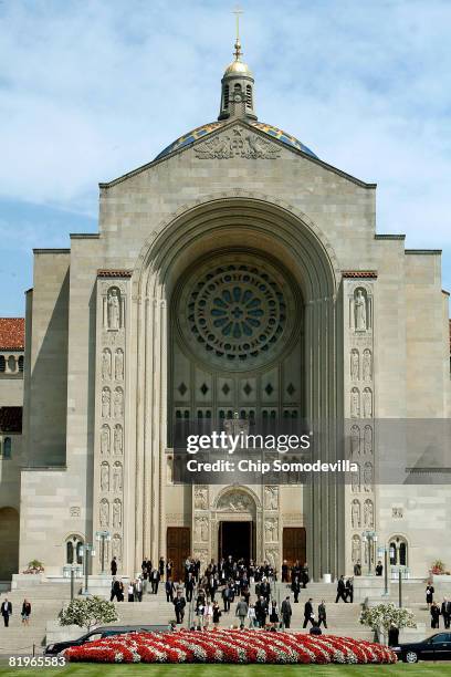 Guests leave the funeral for former White House Press Secretary Tony Snow at the Basilica of the National Shrine of the Immaculate Conception July...