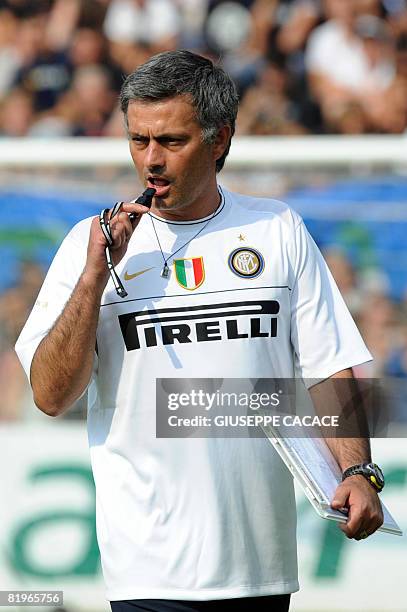 Inter Milan coach Jose Mourinho of Portugal blows a whistle during a training session at "La Pinetina", the club's Training Camp at Appiano Gentile,...