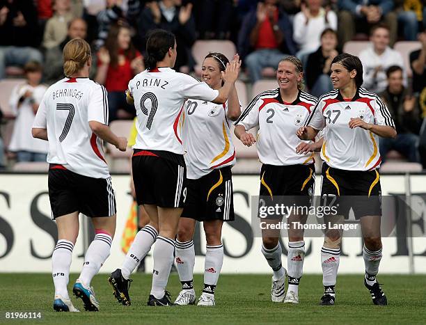 Babett Peter, Birgit Prinz, Renate Lingor, Kerstin Stegemann and Ariane Hingst of Germany celebrate Prinz's 2-0 goal during the Women's International...