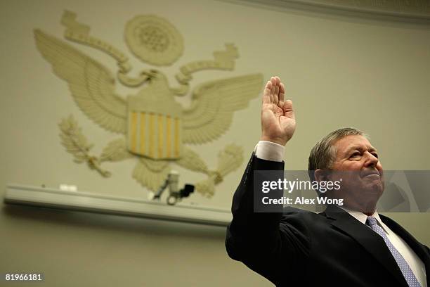 Former U.S. Attorney General John Ashcroft is sworn in to testify during a hearing before the House Judiciary Committee on Capitol Hill July 17, 2008...