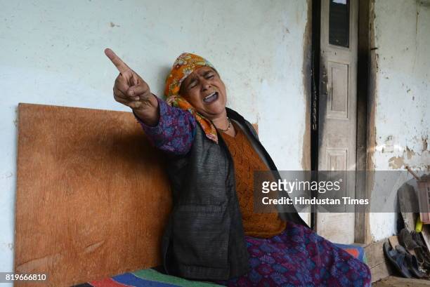 Kesri Devi mother of accused of rape and murder of teenage girl Rajender, talking to the reporter during an interview at her house in village Hilaila...