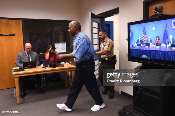 Former professional football player O.J. Simpson arrives for a parole hearing at Lovelock Correctional Center in Lovelock, Nevada, U.S. On Thursday,...