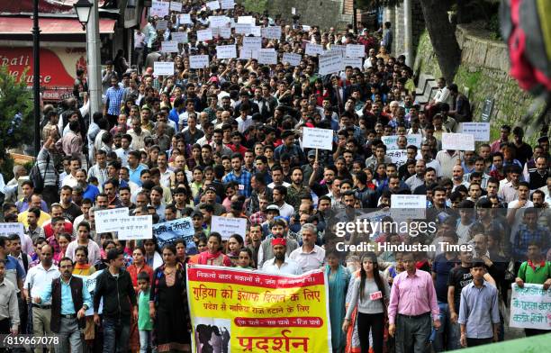 Supporters of SFI protest against rape and murder of Kotkhai girl at Mall road on July 20, 2017 in Shimla, India. For a fortnight now, the...