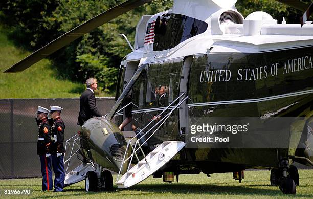 President George W. Bush boards Marine One following the funeral service for former White House Press Secretary Tony Snow at the Catholic University...