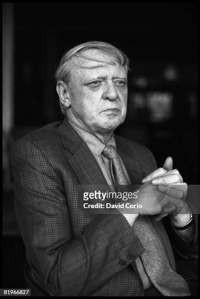 British auther Anthony Burgess poses for a portrait in 1981 at The savoy Hotel in London, England.