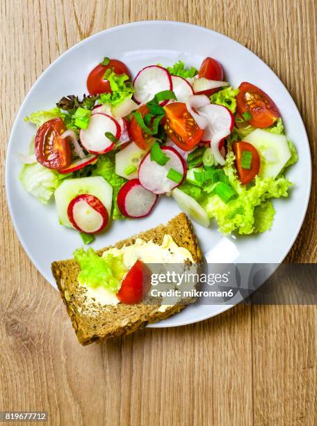 healthy eating - sandwich with fresh vegetables, tomato, radish, lettuce, cucumber. - eating brown bread stock pictures, royalty-free photos & images