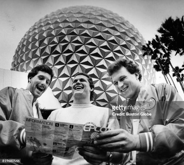 Standing in front of the "Spaceship Earth" globe at the EPCOT Center at Walt Disney World, Boston College players, form left, Jim Brown, Scott...