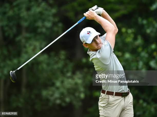 Jared du Toit of Canada tees off from the fifth hole during round one of the Mackenzie Investments Open held at Club de Golf Les Quatre Domaines on...