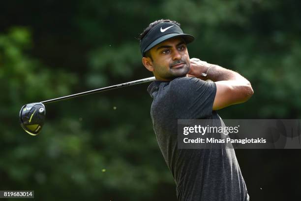 Manav Shah of the United States tees off from the fifth hole during round one of the Mackenzie Investments Open held at Club de Golf Les Quatre...