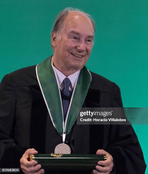 July 20: His Highness Shah Karim al-Hussaini, Prince Aga Khan shows the medal and diploma during the ceremony in which he was awarded with the...