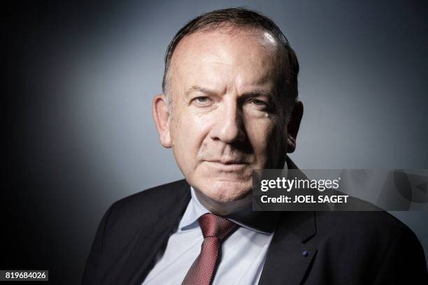 French employer federation Medef head Pierre Gattaz, poses during a photo session in Paris on July 20, 2017.