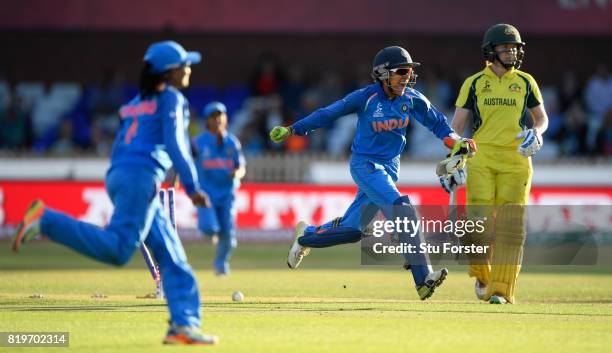 Australia batsman Alex Blackwell is bowled as Sushma Verma celebrates victory during the ICC Women's World Cup 2017 Semi-Final match between...