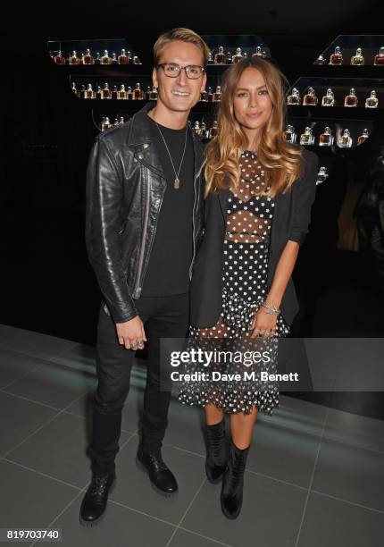 Ollie Proudlock and Emma Louise Connolly attend the Emporio Armani You Fragrance launch at Sea Containers on July 20, 2017 in London, England.