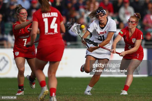 Taylor Cummings of USA surges past Charlotte Lytollis of England during the semi-final match between England and USA during the 2017 FIL Rathbones...