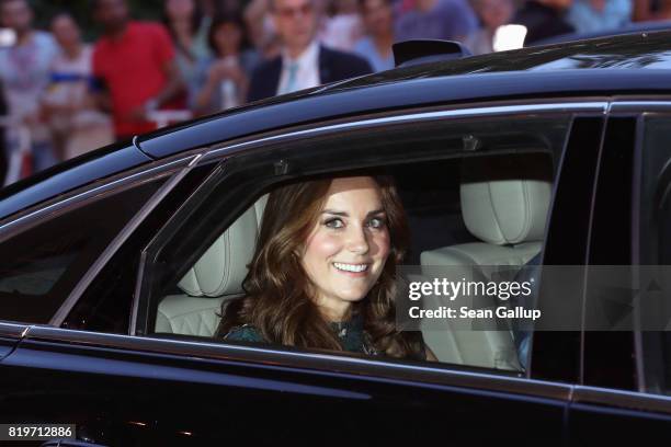 Catherine, Duchess of Cambridge and Prince William departs after attending a reception with creatives at 'Claerchens Ballhaus' the last original...